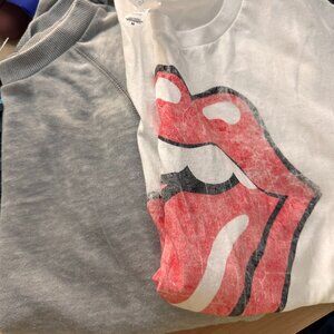 @meaganklappy from posh show - white rolling stones shirt